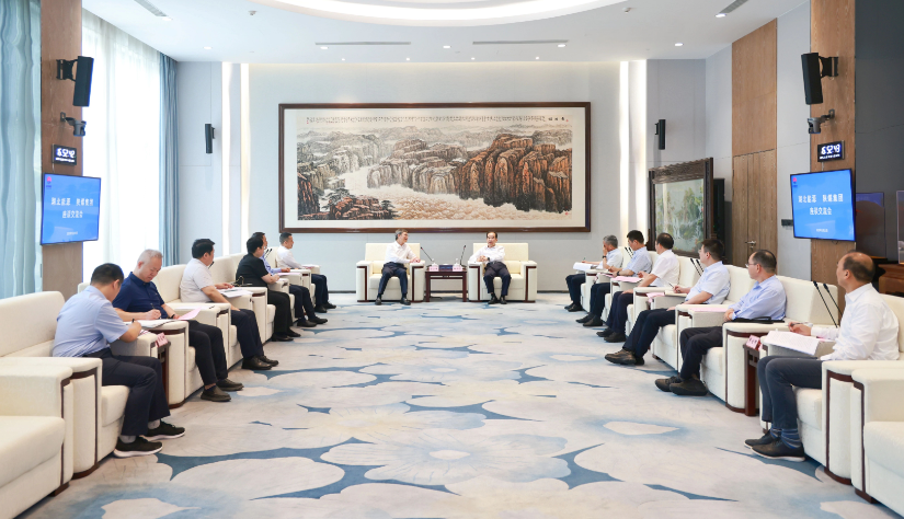 湖北能源集团总经理、党委副书记涂山峰一行到陕煤集团座谈交流